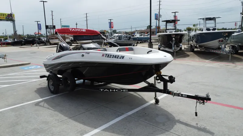 Slide: The Image of 2021 TAHOE TAHT16 boat on trailer in dealership lot. - 6