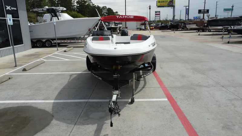 Slide: The Image of 2021 TAHOE TAHT16 boat on trailer in dealership parking lot. - 7