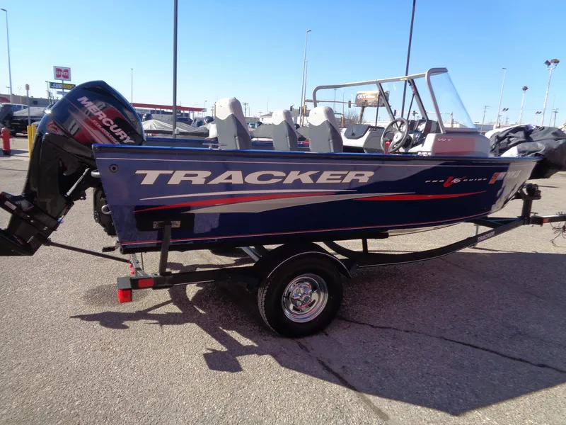 Slide: The Image of 2018 Tracker Pro Guide V-16 WT boat on trailer, outdoor display. - 3
