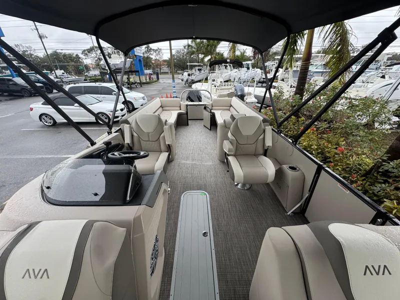 Slide: The Image of 2025 Avalon Catalina Quad Lounge boat interior with spacious seating and modern design. - 30