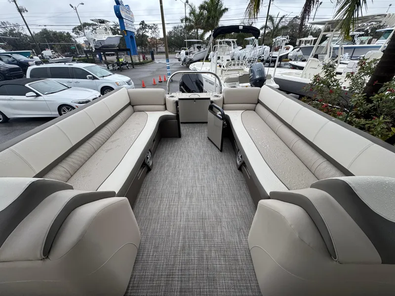 Slide: The Image of 2025 Avalon Catalina Quad Lounge boat interior with spacious seating and modern design. - 33
