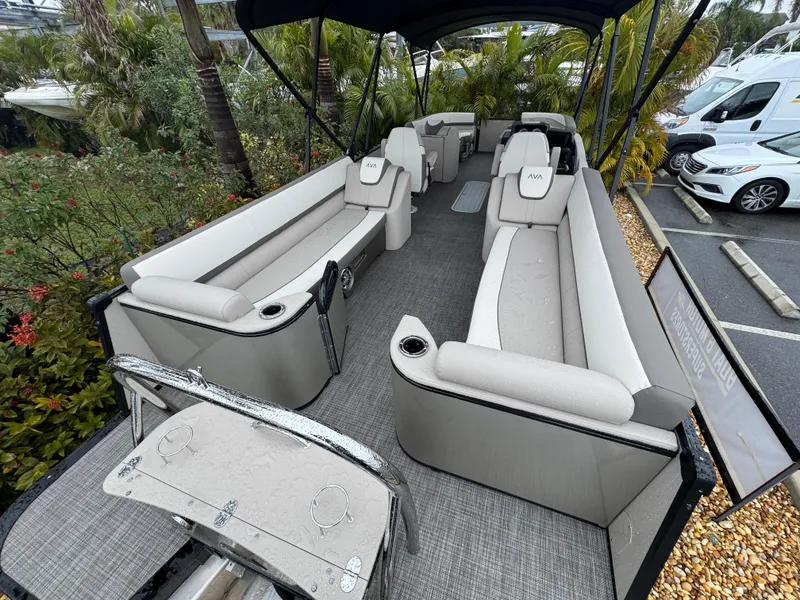 Slide: The Image of 2025 Avalon Catalina Quad Lounge 23' pontoon boat with spacious seating and modern design. - 7