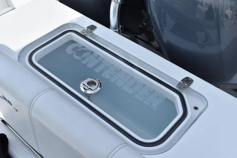 Slide: The Image of 2025 Contender 25T boat livewell with logo and stainless steel fittings. - 10