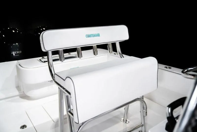 Slide: The Image of 2025 Contender 25T boat interior with white seating and chrome accents. - 13