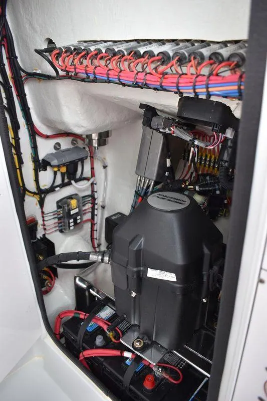 Slide: The Image of Electrical system of a 2025 Contender 25T boat, showcasing wiring and components. - 20