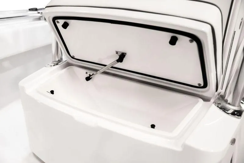 Slide: The Image of Open storage compartment on 2025 Contender 25T boat, showcasing interior space. - 7
