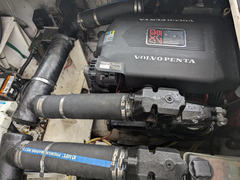 Slide: The Image of Engine compartment of a 2006 Cruisers Yachts 320 Express with Volvo Penta engine. - 27