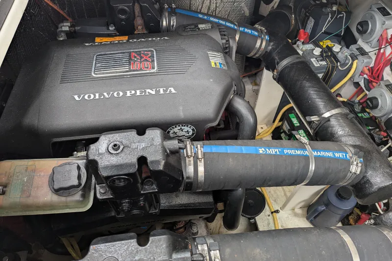 Slide: The Image of Engine compartment of a 2006 Cruisers Yachts 320 Express with Volvo Penta engine. - 28