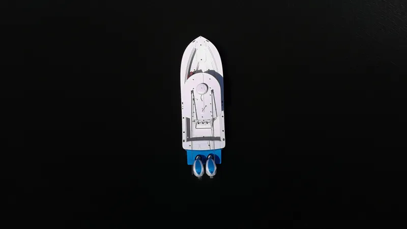 Slide: The Image of Aerial view of a 2019 Regulator 25 boat on dark water. - 10