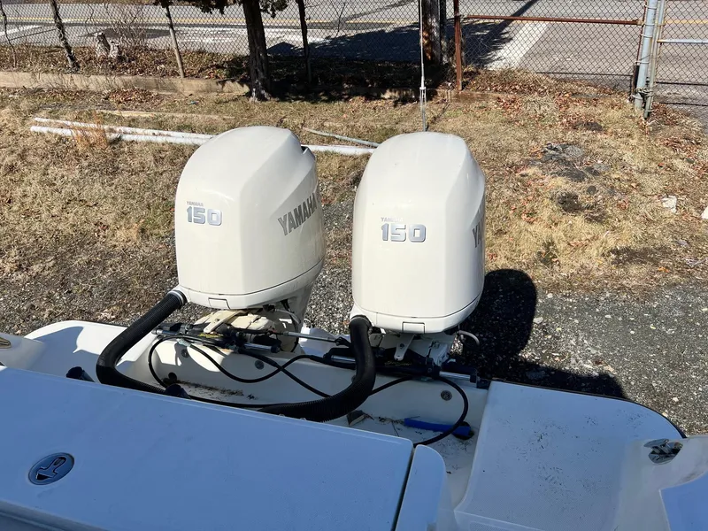 Slide: The Image of Twin Yamaha 150 outboard engines on a 2006 Hydra-Sports Vector 2500 CC boat. - 4