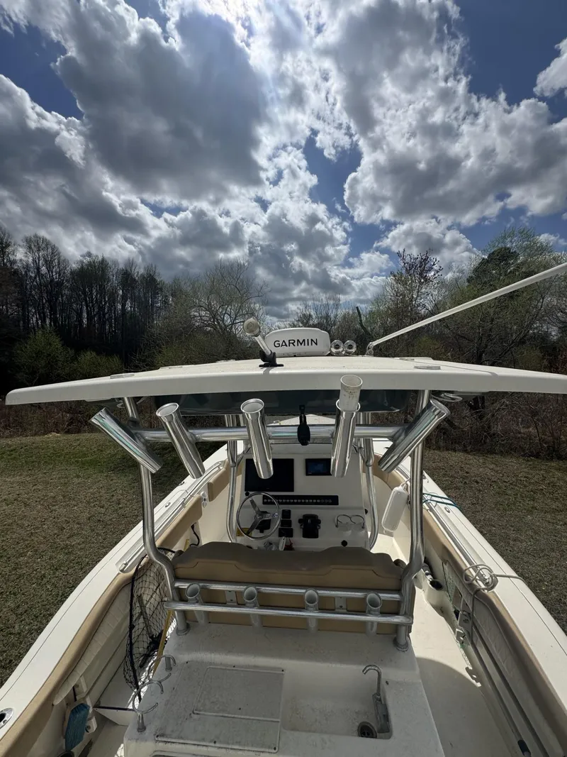 Slide: The Image of 2018 Key West 263 FS boat with Garmin equipment under a cloudy sky. - 2