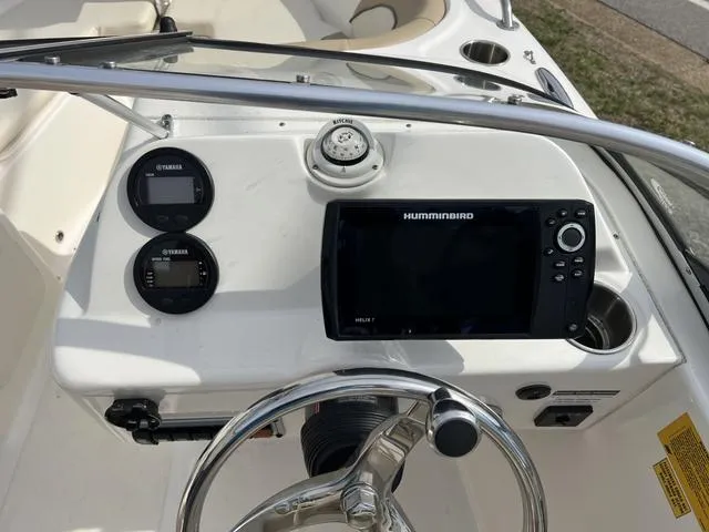 Slide: The Image of 2018 Key West 186DC boat dashboard with Humminbird GPS and Yamaha gauges. - 9