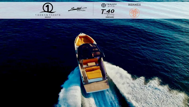 Slide: The Image of 2024 Tesoro T40 Inboard yacht cruising on open water, showcasing luxury design and performance. - 11