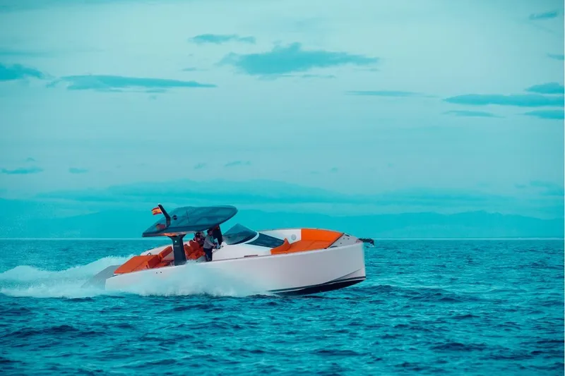 Slide: The Image of 2024 Tesoro T40 Inboard cruising on open sea under clear sky. - 17