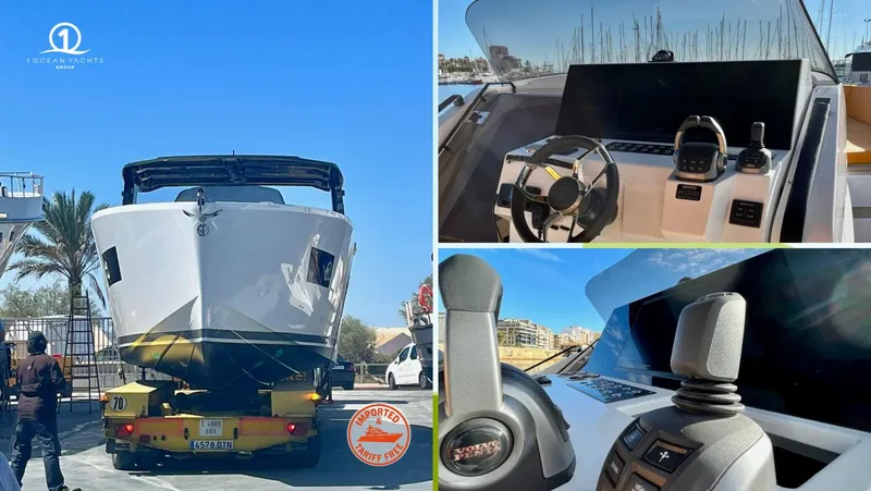 Slide: The Image of 2024 Tesoro T40 Inboard boat on trailer, showcasing sleek design and modern cockpit controls. - 9