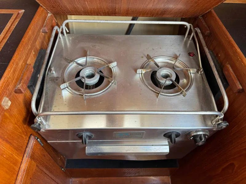Slide: The Image of Stainless steel two-burner stove in a 1981 Bristol 29.9 boat galley. - 19