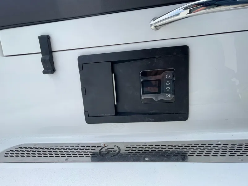 Slide: The Image of Control panel on 2025 Sea Pro 245 Sandbar boat, featuring sleek design and modern interface. - 16