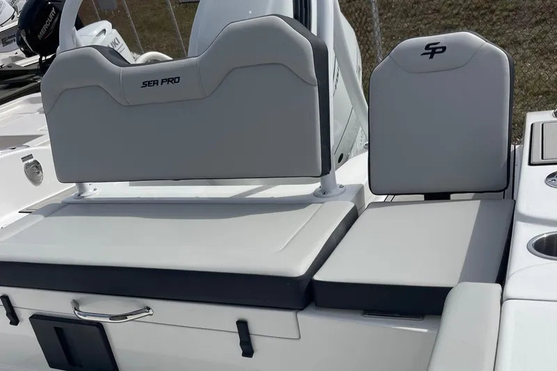 Slide: The Image of 2025 Sea Pro 245 Sandbar boat seating area with gray cushions and backrests. - 36