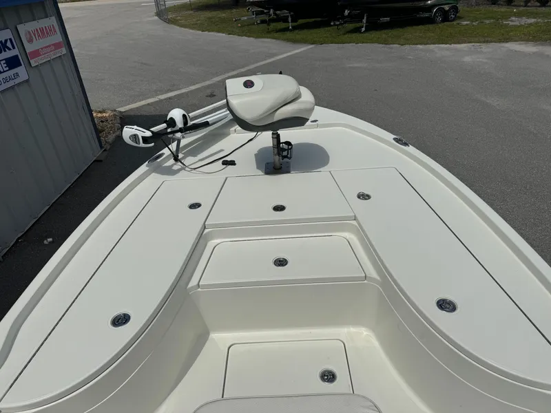 Slide: The Image of 2010 Ranger 2310 boat deck with seating and storage compartments. - 6