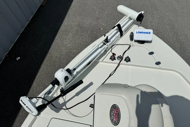 Slide: The Image of 2010 Ranger 2310 boat deck with Lowrance equipment and trolling motor. - 7