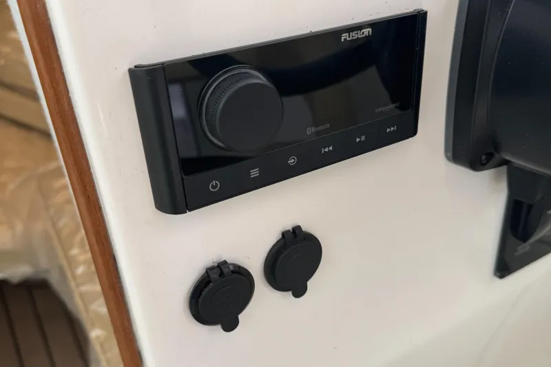 Slide: The Image of Control panel on 2022 Oceania 23WA boat with Fusion audio system. - 8