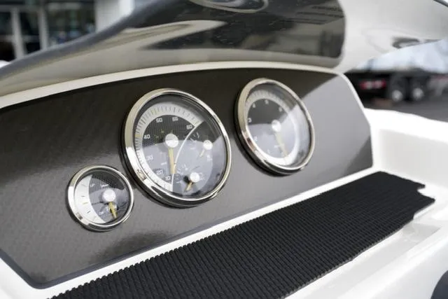 Slide: The Image of 2025 Bayliner Element M19 dashboard with sleek gauges and modern design. - 20