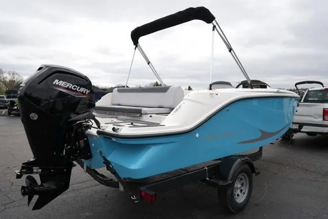 Slide: The Image of 2025 Bayliner Element M19 boat with Mercury engine on trailer. - 4