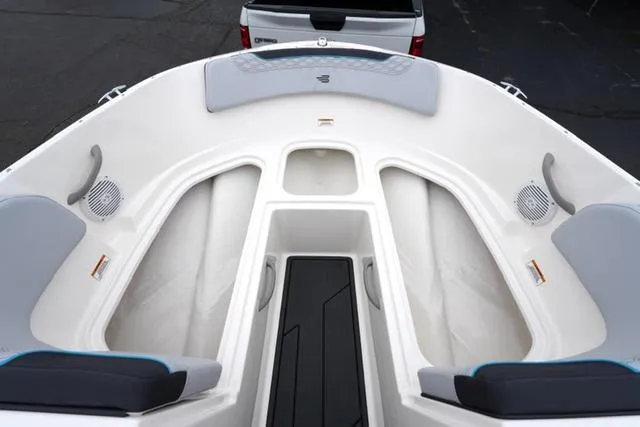 Slide: The Image of 2025 Bayliner Element M19 boat interior with seating and storage compartments. - 8