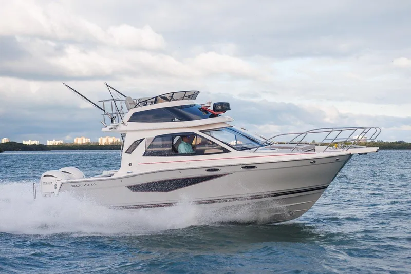 The Image of 2026 Solara S 310 SB yacht cruising on open water, showcasing sleek design and performance. - 0