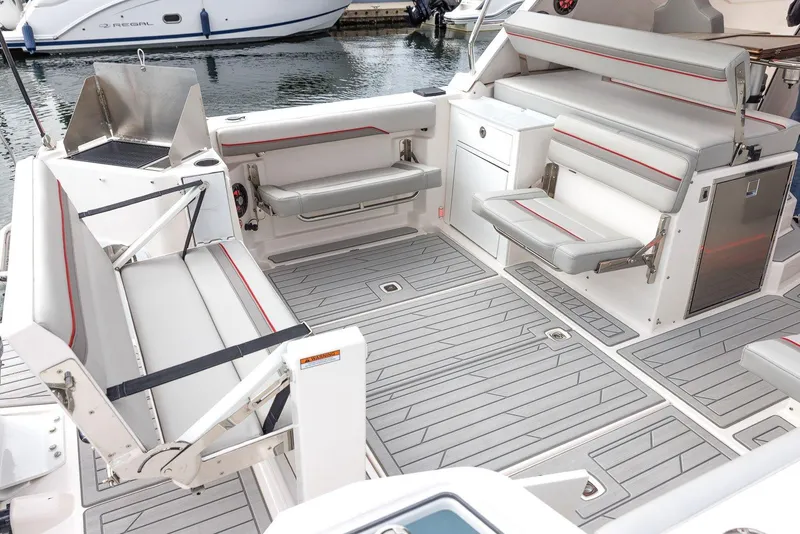 Slide: The Image of 2026 Solara S 310 SB boat interior with modern seating and sleek design. - 18
