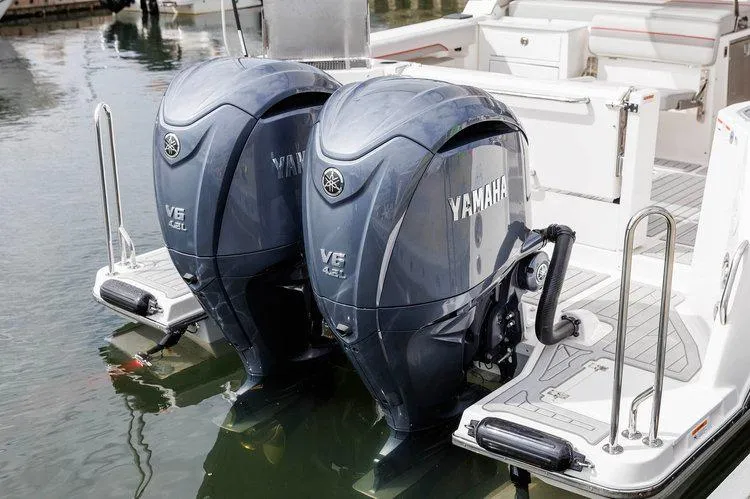 Slide: The Image of Twin Yamaha V6 outboard engines on a 2026 Solara S 310 SB boat. - 21