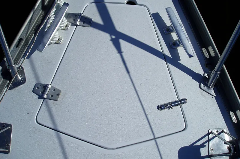 Slide: The Image of Interior of a 1982 Baltic 42 yacht with wooden cabinetry and kitchen area. - 12