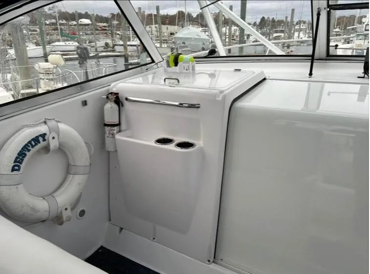 Slide: The Image of 2005 Pro-Line 33 Express boat interior with life preserver and fire extinguisher. - 9