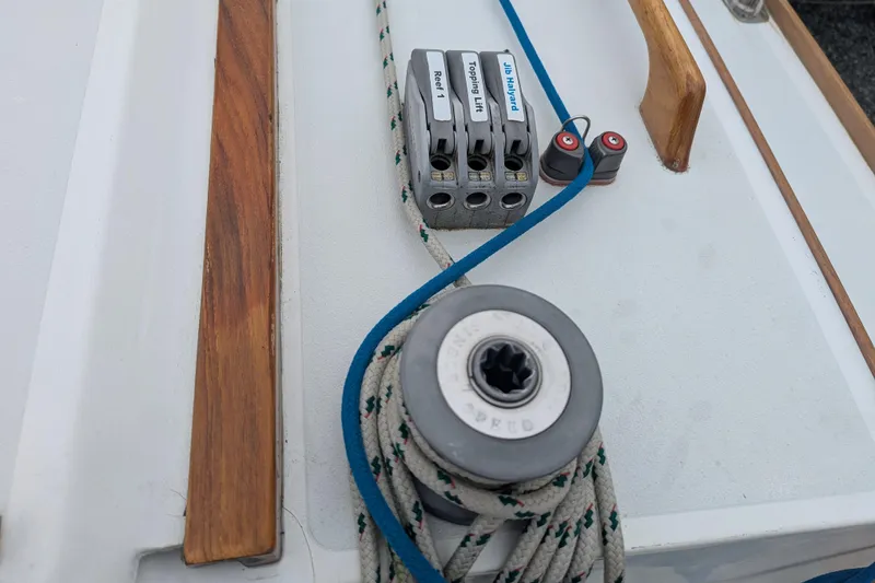 Slide: The Image of Sailing equipment on 2012 Alerion Express 28, featuring winch and rope clutches. - 17