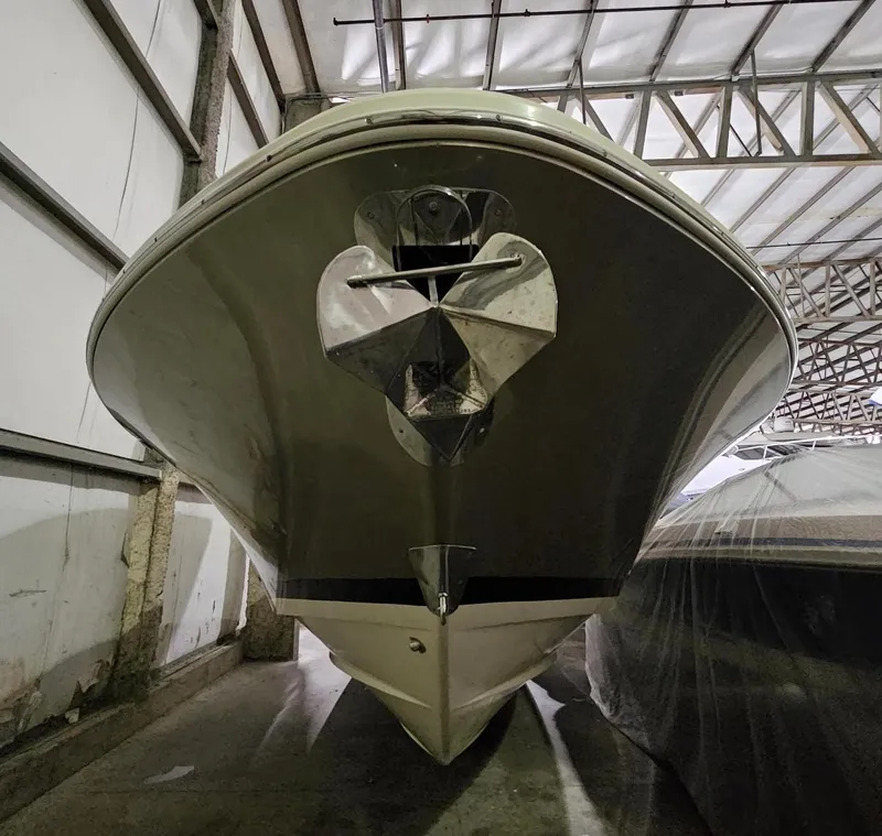 Slide: The Image of 2018 Chris-Craft 30 Catalina boat in storage, viewed from the front. - 7