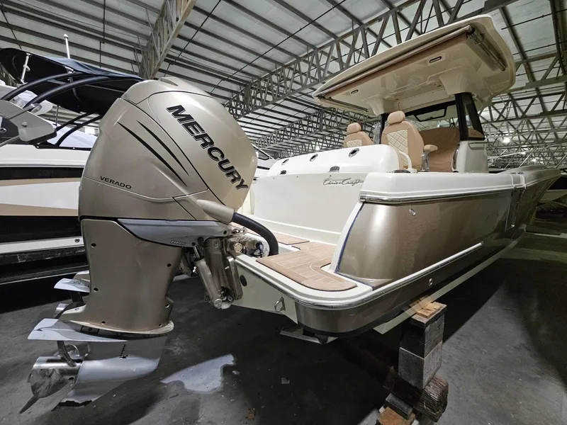 Slide: The Image of 2018 Chris-Craft 30 Catalina boat with Mercury Verado engine in storage facility. - 9