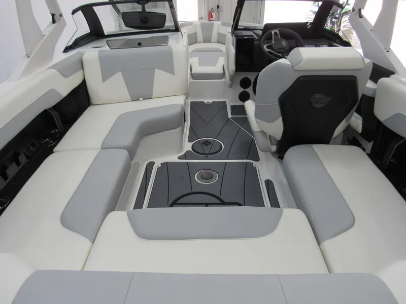Slide: The Image of 2025 Malibu Wakesetter 20 VTX interior with gray and white seating, modern design. - 3
