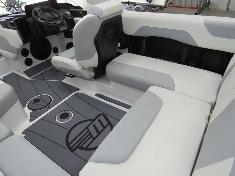 Slide: The Image of 2025 Malibu Wakesetter 20 VTX interior with sleek seating and modern dashboard design. - 4