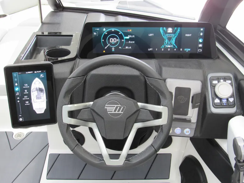 Slide: The Image of 2025 Malibu Wakesetter 20 VTX dashboard with advanced digital displays and steering wheel. - 8