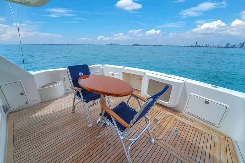 Slide: The Image of Luxury yacht deck with chairs and table, Riviera 51 Enclosed Bridge, 2008 model. - 17