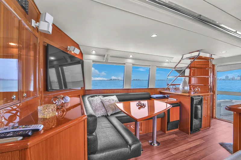 Slide: The Image of Luxurious interior of 2008 Riviera 51 Enclosed Bridge yacht with ocean view. - 26