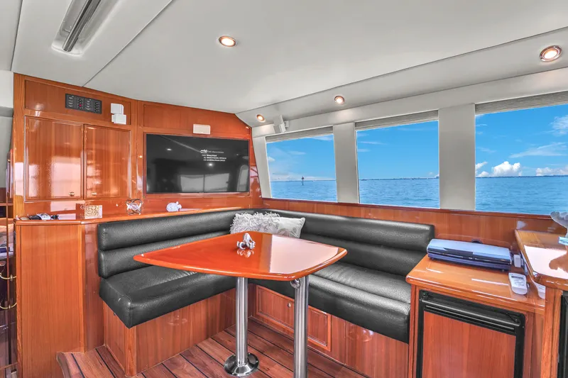 Slide: The Image of Luxurious interior of 2008 Riviera 51 Enclosed Bridge yacht with ocean view. - 27