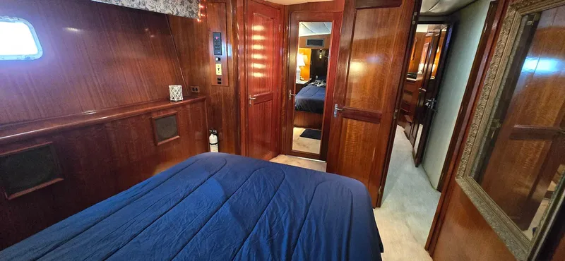 Slide: The Image of Luxurious cabin interior of 1979 Hatteras 60 Enclosed Bridge Convertible yacht. - 31