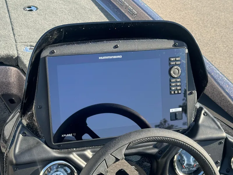 Slide: The Image of 2025 Skeeter ZXR20SE boat dashboard with Humminbird XPLR12 display. - 15