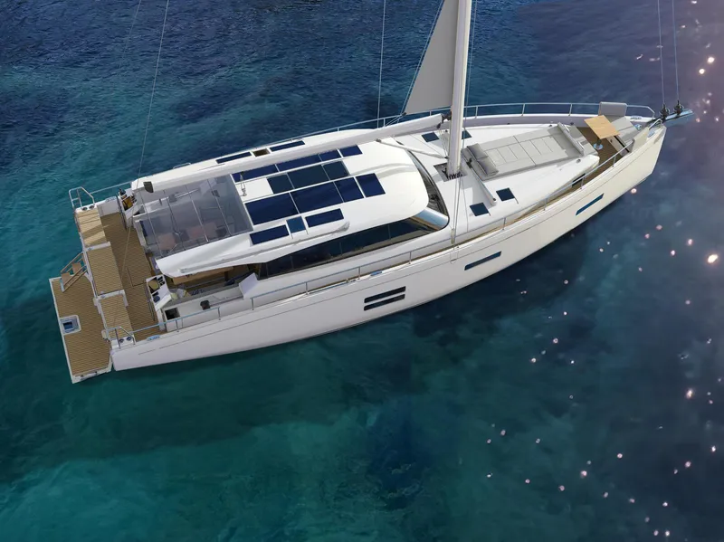Slide: The Image of 2025 Moody 48 Deck Saloon yacht on clear blue water, featuring sleek design and solar panels. - 1
