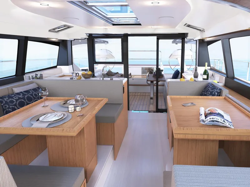 Slide: The Image of Luxurious interior of 2025 Moody 48 Deck Saloon yacht with elegant dining area. - 10