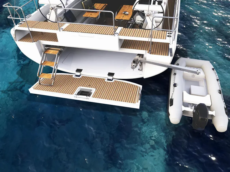 Slide: The Image of Luxury Moody 48 deck saloon yacht with tender, 2025 model, on clear blue water. - 4