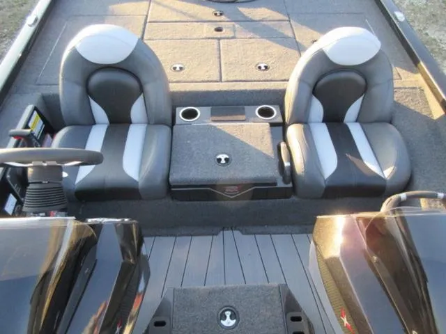 Slide: The Image of 2024 Vexus AVX1880 boat interior with dual seats and storage compartments. - 15