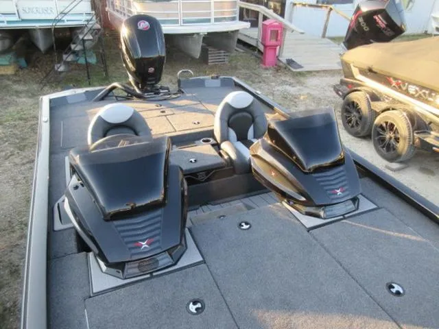 Slide: The Image of 2024 Vexus AVX1880 boat with Mercury 115 ProXS engine, dual seats, and sleek design. - 11