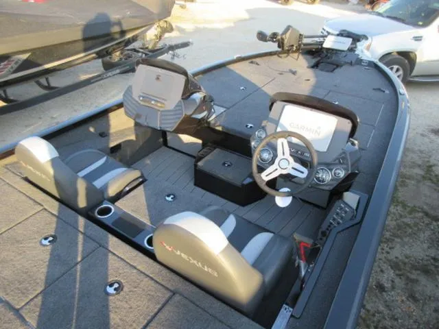 Slide: The Image of 2024 Vexus AVX1880 boat interior with Garmin system and Mercury 115 ProXS engine. - 8